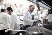 picture of chef Zach Bell of Addison Reserve Country Club prepping food