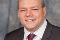 headshot of Rick Dente , COO and GM of St. Andrews Country Club Boca Raton