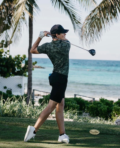 picture of Garrett Clark swinging a golf club
