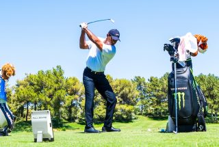 Tiger Woods practicing golf with the Full Swing KIT Launch Monitor