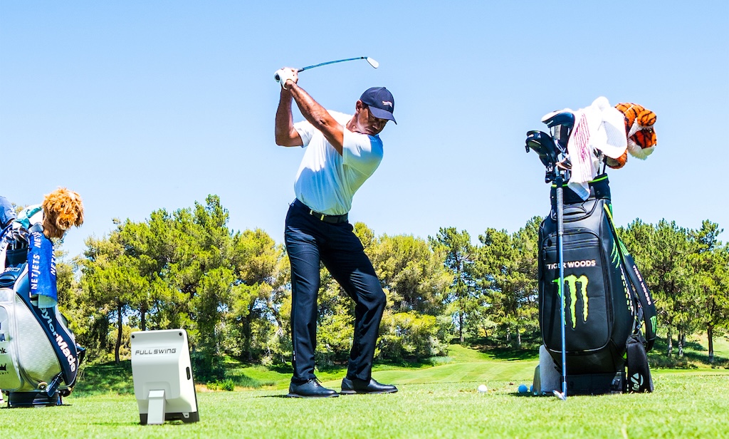 Tiger Woods practicing golf with the Full Swing KIT Launch Monitor